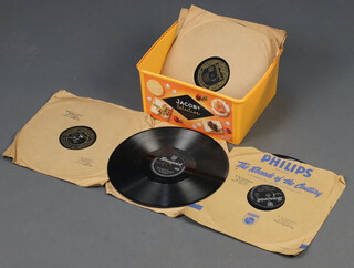 A collection of 7 10" shellac records to include 1 Buddy Holly Rave On and 7 Bill Haley and The Comets - Shake Rattle and Roll and Rock Around the Clock  