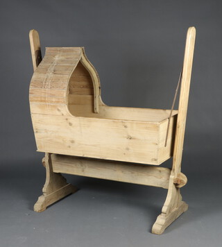 A child's 19th Century pine crib 199cm h x 100cm w x 46cm d 
