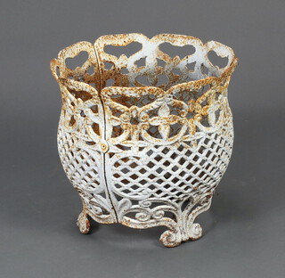 A cylindrical pierced cast iron planter frame 30cm x 33cm (no base) 