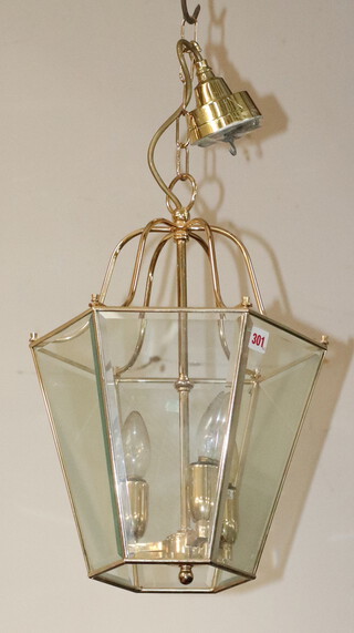 A hexagonal gilt metal and glass hanging light fitting 44cm h x 31cm w 