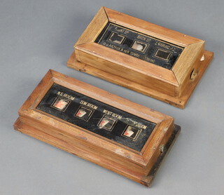 E J Arthur & Sons of Dorking, a 3 aperture servants indicator board contained in a pine case 7cm x 33cm x 18cm together with a 4 aperture ditto 7cm x 37cm x 17cm (glass cracked)
