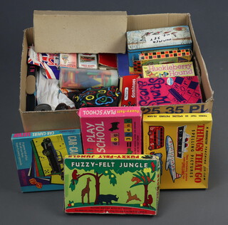 A box of children's games including a boxing puppet, etc 