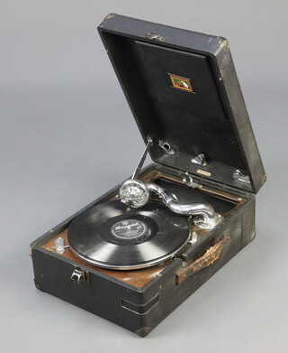 His Master's Voice, a portable manual gramophone contained in a black fibre carrying case together with a collection of 78rpm records contained in a red carrying case 