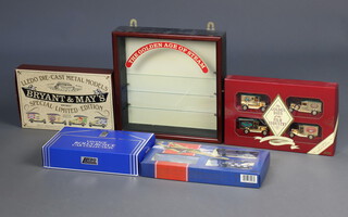 A Lledo die cast metal model set Bryant and May special edition boxed, ditto Golden Age of the Film Industry boxed, Vintage Rolls Royce Collection boxed and a Dambusters 50th Collection boxed together with a wall mounting display cabinet "The Golden Age of Steam" 