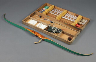 A Falken bow together with a collection of arrows, contained in a wooden case 