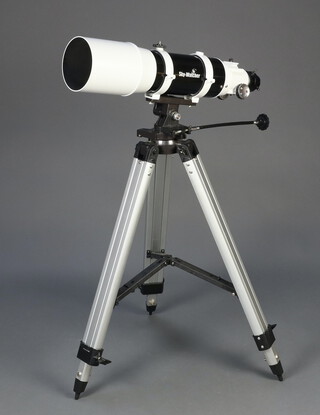 A Sky-Watcher telescope complete with tripod 