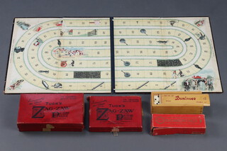 A J Jakes Wheeling game board, 2 Tucks Zag-Zaw picture tiles, 2 sets of dominoes 