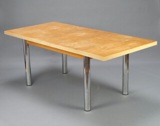 A mid 20th Century teak and chrome rectangular drop flap dining table, raised on chrome supports 74cm h x 90cm w x 136cm l x 193cm when extended (top slightly warped, water and ring marks) 