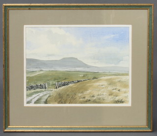 J Piggott, watercolour, Scottish landscape 26cm x 34cm together with Cabel, oil on canvas, mountainous scene 20cm x 25cm (2)