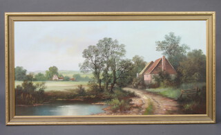 20th Century oil on canvas, rural scene with buildings 50cm h x 100cm 