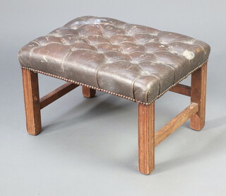 A Georgian style rectangular mahogany framed footstool upholstered in brown buttoned leather 36cm h x 58cm w x 43cm d (1 stretcher missing) 