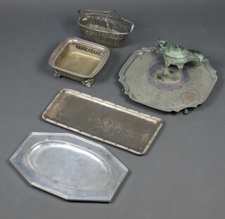 A silver plated salver with bracketed border, raised on scroll feet, 2 rectangular silver plated sandwich platters and other plated items 