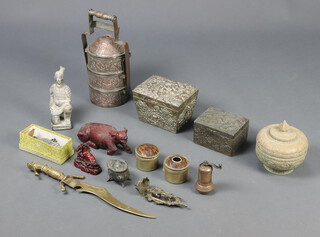 A cylindrical pressed metal tiffin style box, a carved wooden figure of a seated buffalo, 2 antimony boxes and various Eastern curios 