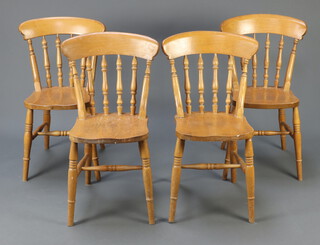 A set of 4 beech framed Windsor style bar back dining chairs on turned supports with H framed stretcher 84cm h x 37cm w x 38cm d (some contact marks)