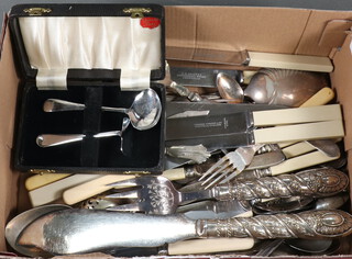 A chromium plated childs spoon and pusher together with a quantity of silver plated flatware 
