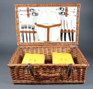 A fitted wicker picnic hamper 