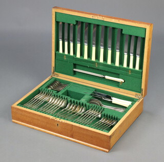 A canteen of silver plated flatware contained in an oak canteen box 