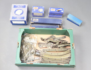 A Hornby Dublo battery control unit, a power control unit A3 and various Dublo track 