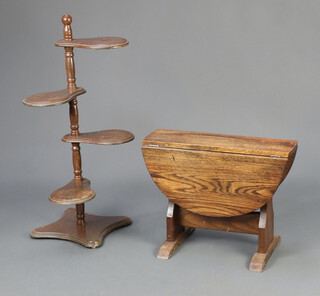 An oak oval drop flap occasional table 37cm x 47cm x 15cm together with a beech 4 tier plant stand raised on a shaped base 