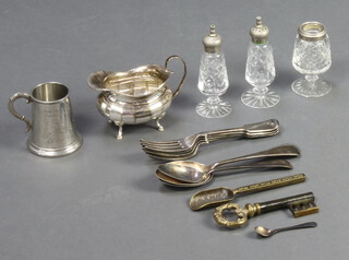 A silver plated sauce boat and minor plated wares
