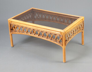 A rectangular bamboo and plate glass coffee table 41cm h x 81cm w x 53cm d 