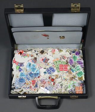 A collection of GB used stamps contained in a briefcase 