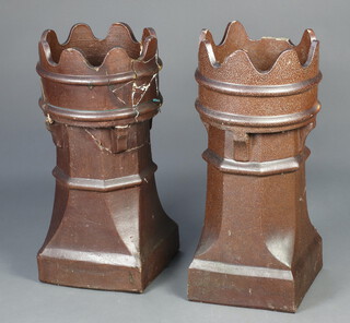 A pair of Victorian brown glazed chimney pots 74cm h x 33cm diam. (some damage to both) 