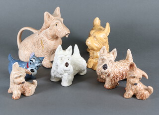 A Sylvac style "Doggy" teapot in the form of a terrier and 6 other ceramic figures of dogs 