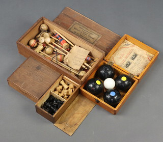 A Banda mini bowls set boxed, an indoor croquet set and a turned wood chess seat 