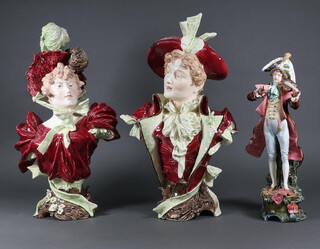 Two Edwardian pottery portrait busts of a lady and gentleman (both a/f) with a figure of a viola player 
