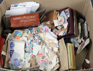 A small collection of GB first day covers and loose GB and world stamps