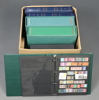 Two green Schaubek empty stamp albums and 4 others 