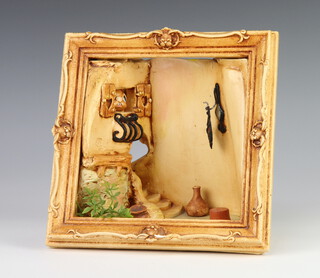 A Pendelfin diorama of a room enclosed in a frame 20cm (minor chip to frame) 