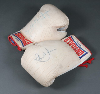A pair of Lonsdale boxing gloves, 1 bearing signature of Marvin Hagler, the other indistinctly signed 