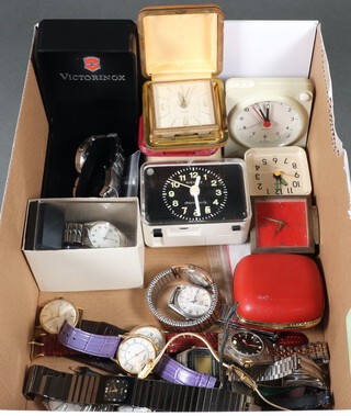A gentleman's Victoria Knox steel quartz wristwatch, minor wristwatches and bedroom timepieces 