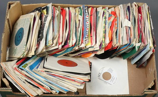 An interesting collection of 60's and 70's 45rpm vinyl records, some in mint condition 