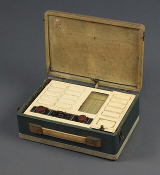 A vintage portable manual radio contained in a fibre case 10cm x 29cm x 20cm 