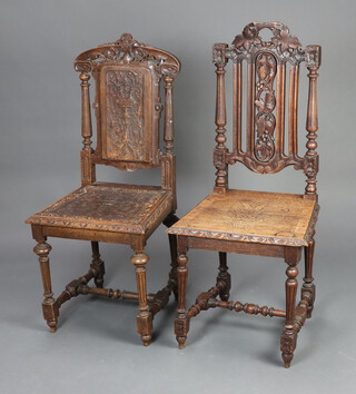 Two similar Victorian carved oak Carolean style hall chairs, raised on turned supports both have loose frames 