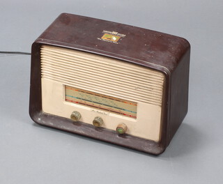 A vintage His Masters Voice brown and cream Bakelite cased radio 28cm h x 40cm w x 18cm d  