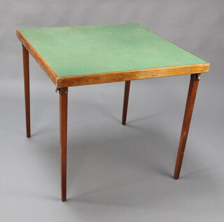 A beech framed folding bridge table with green baize top 67cm h x 76cm w x 76cm d 