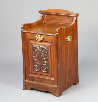 A Victorian carved walnut coal purdonium with carved fall front and liner 69cm h x 37cm w x 34cm d 