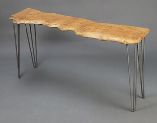 A rustic elm occasional table of shaped outline, raised on hairpin supports 68cm h x 135cm w x 37cm d 