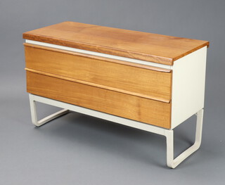 A mid-Century teak and laminate chest of 2 drawers, raised on tubular metal supports 63cm h x 102cm w x 42cm d (contact marks) 