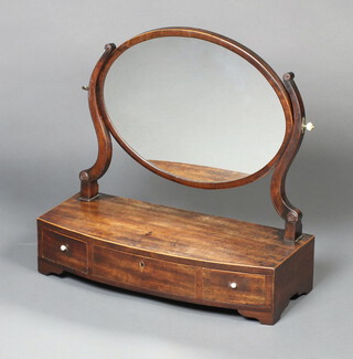 A 19th Century oval plate dressing table mirror contained in a mahogany swing frame on a bow front base, fitted 1 long and 2 short drawers 48cm h x 51cm w x 22cm d (some contact marks and sun bleaching) 