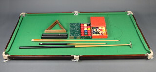 A quarter size billiard table complete with cue rest, 3 cues, balls, triangle and score board 187cm x 97cm together with a set of billiard balls, pool balls and 