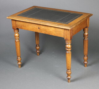 A 19th Century Continental bleached mahogany writing table with inset blue writing surface and 1 frieze drawer, raised on turned and reeded supports 72cm h x 88cm w x 56cm d 