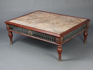 A rectangular mahogany coffee table with veined marble top and pierced iron panel to the apron, raised on turned supports 50cm h x 138cm w x 102cm d