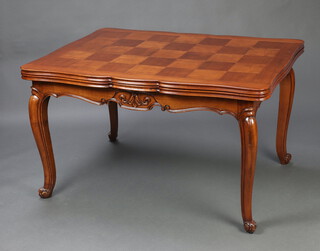 A French walnut and parquetry draw leaf dining table, raised on cabriole supports 75cm h x 98cm w x 130cm l x 232cm l when extended 