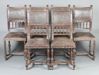 A set of 6 19th Century Continental carved oak and leather high back chairs with spindle decoration and embossed leather seats, raised on turned supports with H framed stretcher 105cm h x 44cm w x 43cm d, (seat 25cm x 27cm)  