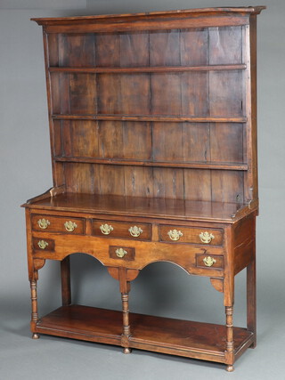 An 18th Century style yew dresser, the raised back with moulded cornice fitted 3 shelves, the base fitted 3 drawers above 3 short drawers, raised on turned supports with potboard 205cm h x 137cm w x 43cm d 